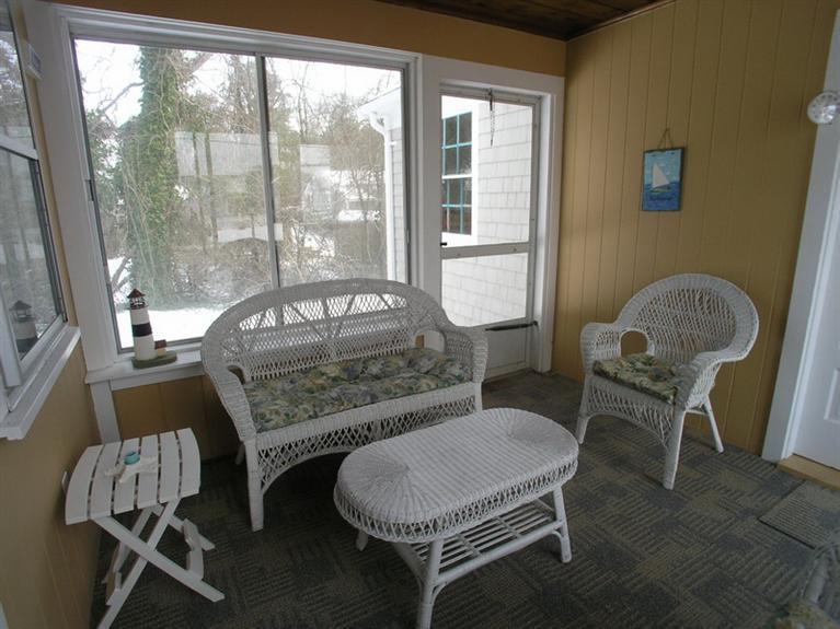 14 Knox Road Dennis Port, MA 02639 - Photo 7 of 14 a bedroom with a bed and a window