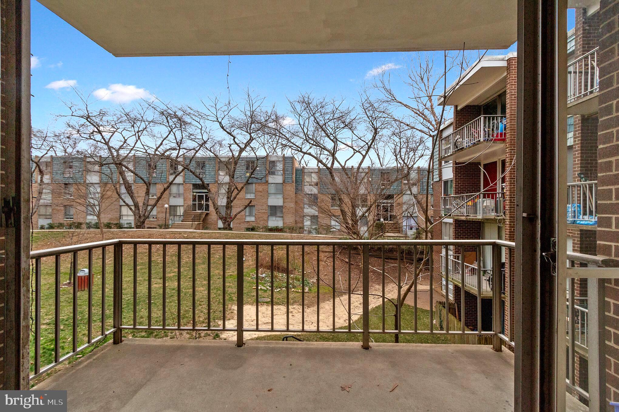 3974 Bel Pre Road, Unit 39744 Silver Spring, MD 20906 - Photo 19 of 31 Private Rear Balcony overlooks common area