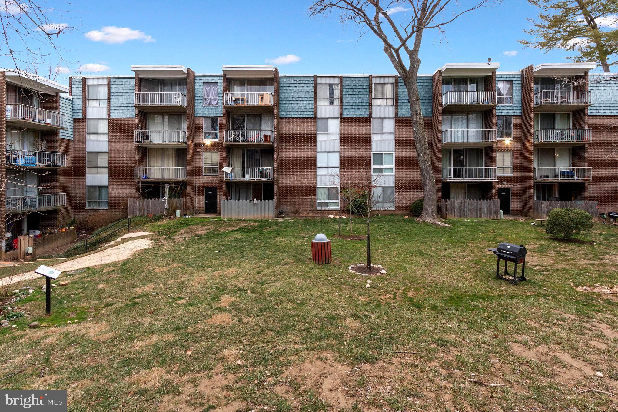 3974 Bel Pre Road, Unit 39744 Silver Spring, MD 20906 - Photo 20 of 31 Rear common area has grills & picnic & play area