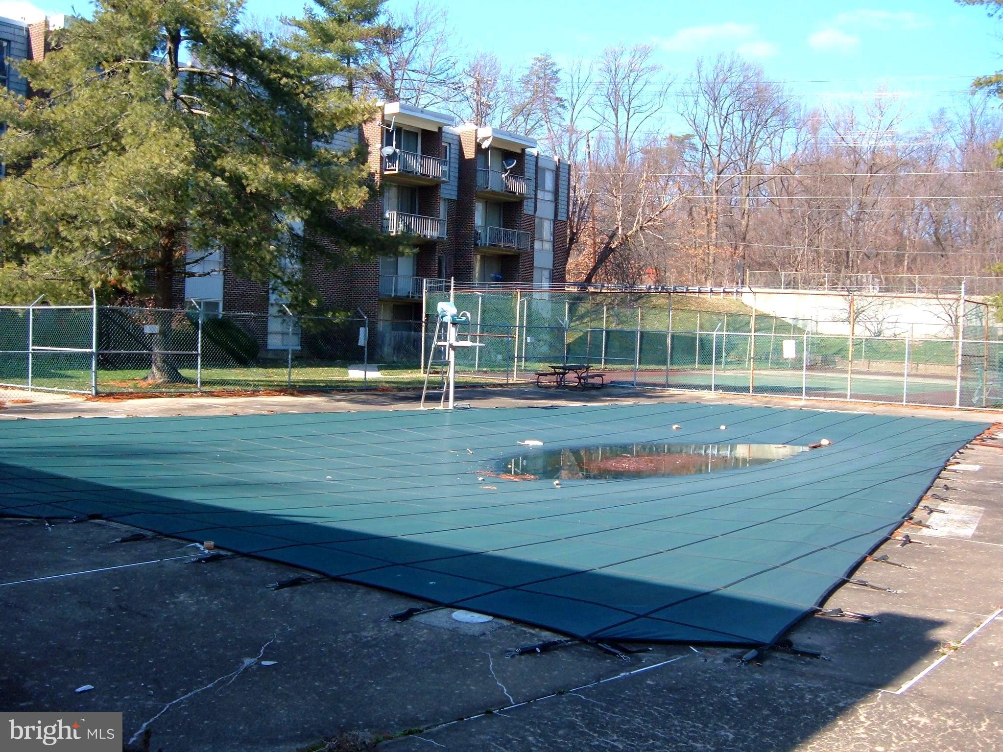 3974 Bel Pre Road, Unit 39744 Silver Spring, MD 20906 - Photo 23 of 31 Community Pool and Tennis Court
