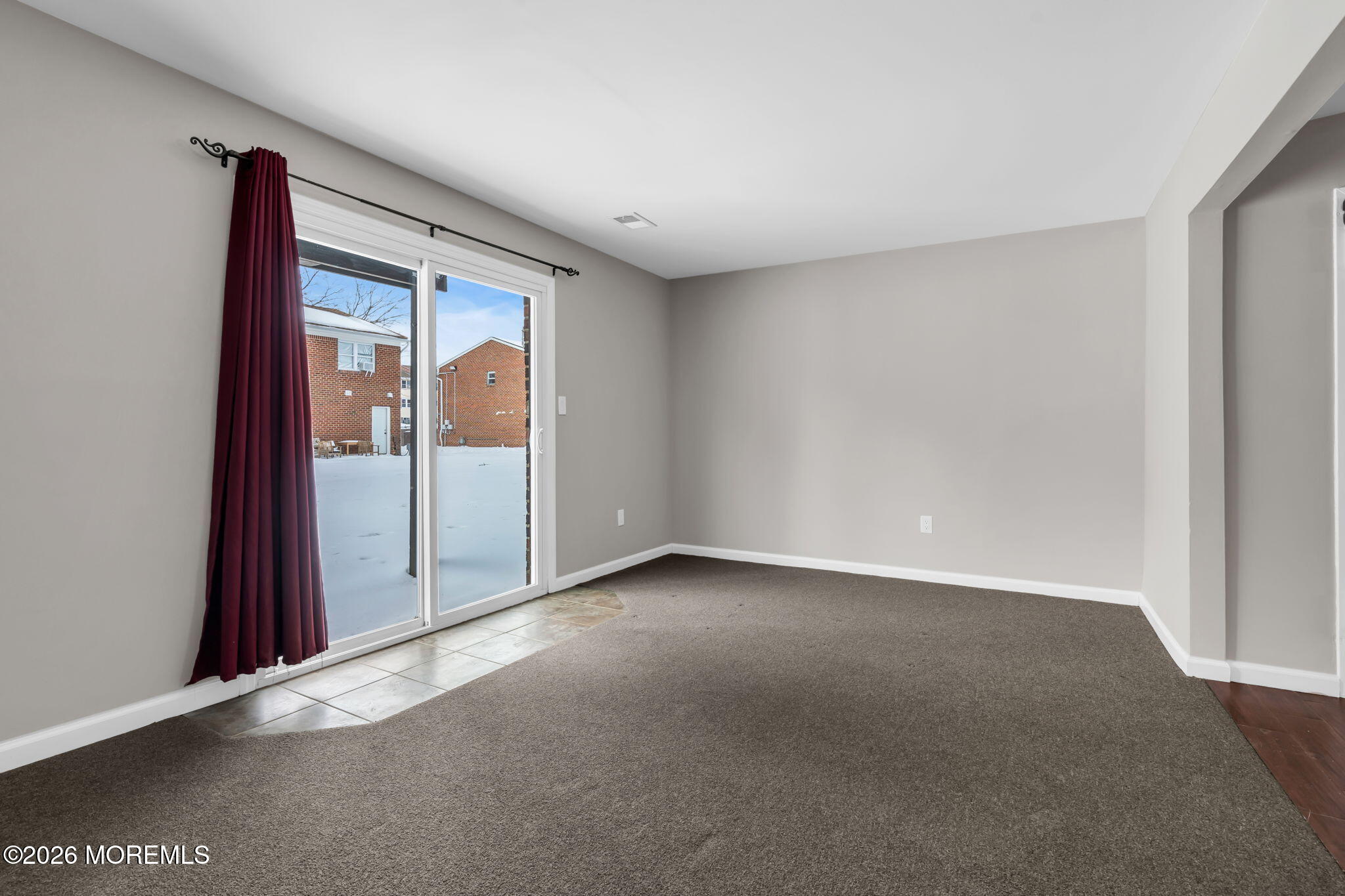 306 Sawmill Road, Unit 182 Brick, NJ 08724 - Photo 13 of 24 a view of an empty room with a window