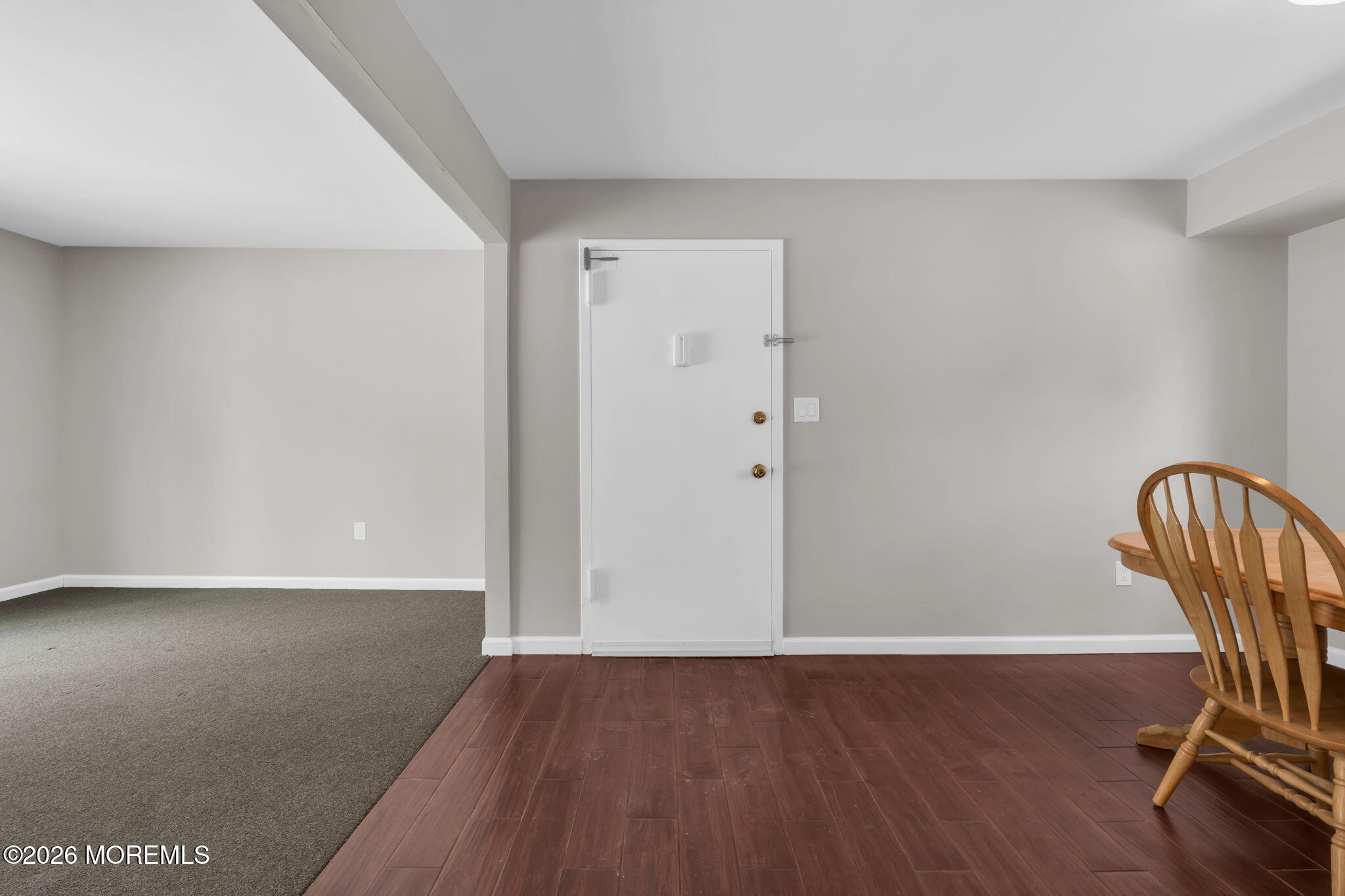 306 Sawmill Road, Unit 182 Brick, NJ 08724 - Photo 2 of 24 a view of room with wooden floor and chair