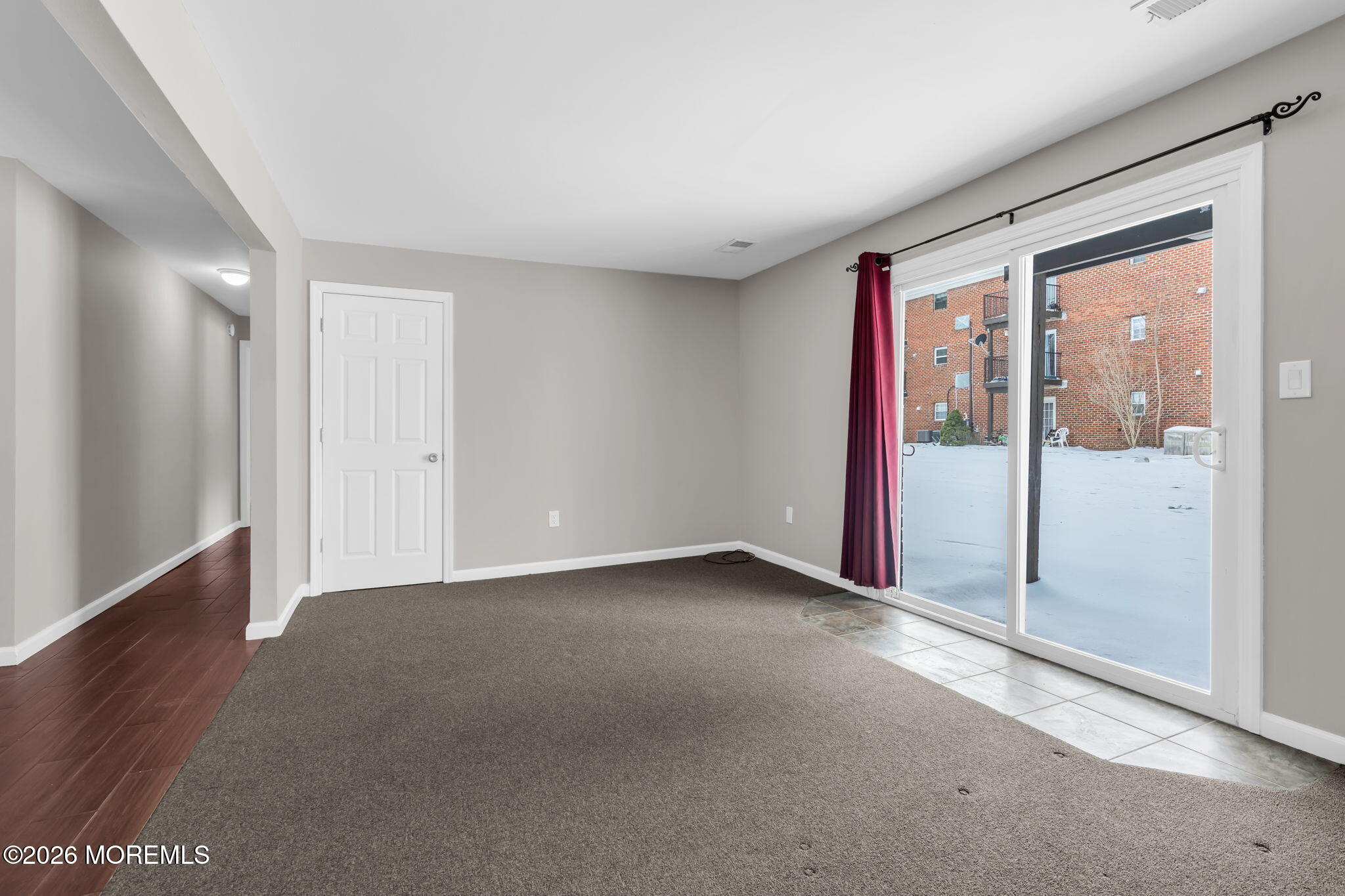 306 Sawmill Road, Unit 182 Brick, NJ 08724 - Photo 7 of 24 a view of an empty room with a window