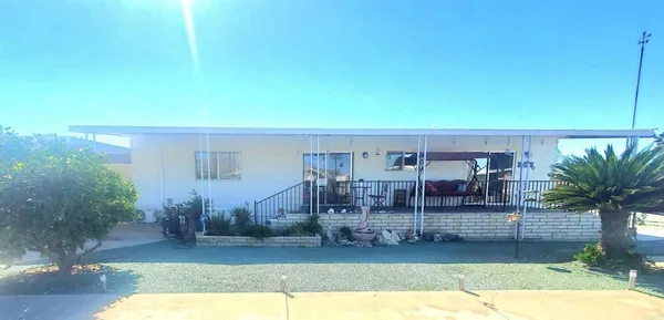 a view of a house with a patio