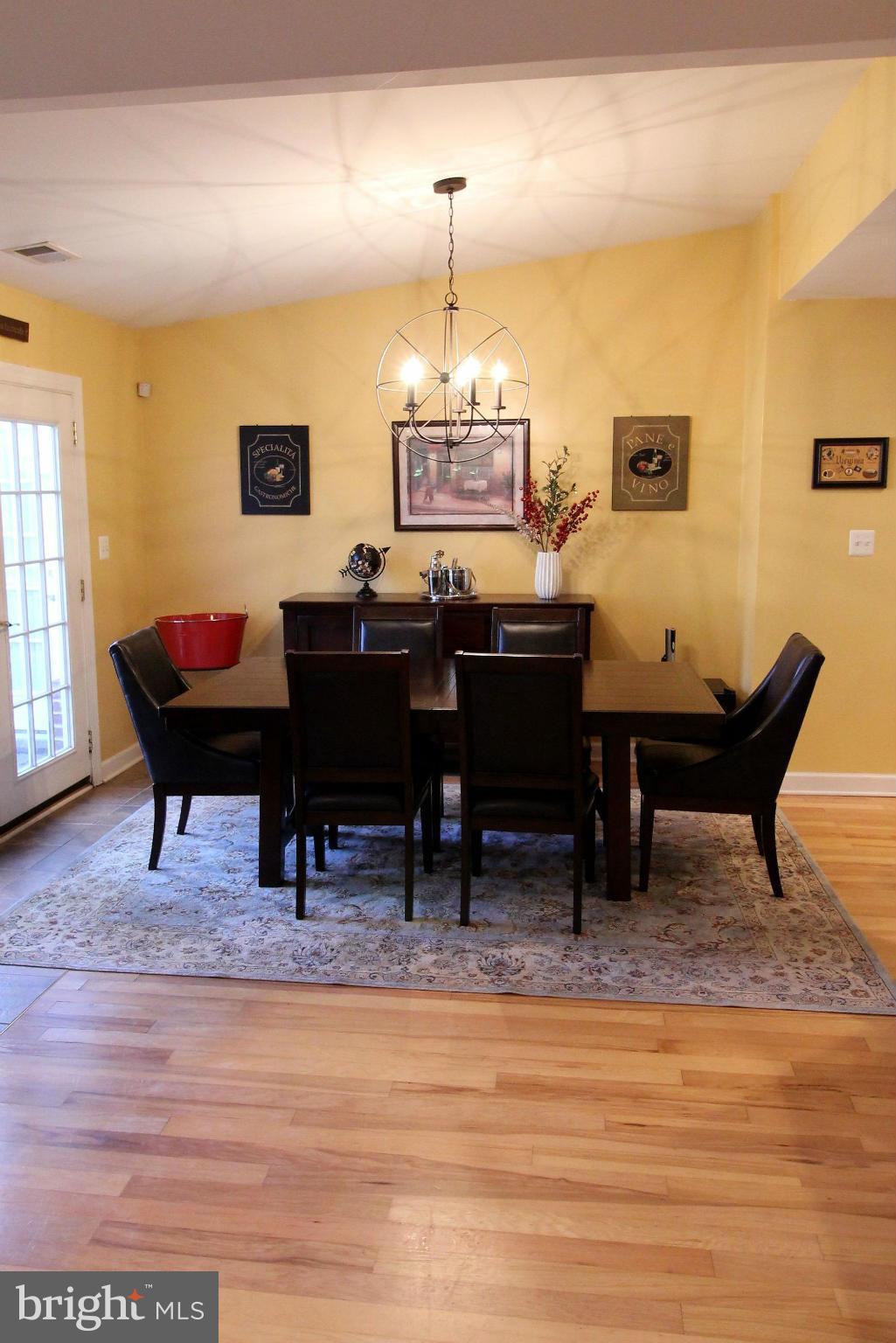 7308 Inzer Street Springfield, VA 22151 - Photo 9 of 30 a view of a room with furniture window and wooden floor