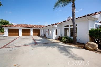 3786 Foxglove Lane Fallbrook, CA 92028 - Photo 2 of 34 a front view of a house with a garden