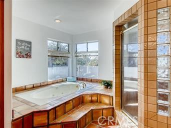 3786 Foxglove Lane Fallbrook, CA 92028 - Photo 21 of 34 a bathroom with a tub and a shower