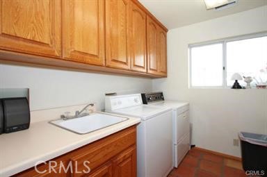 3786 Foxglove Lane Fallbrook, CA 92028 - Photo 22 of 34 a utility room with sink dryer and washer