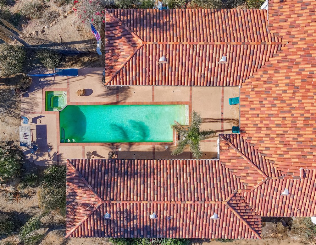 3786 Foxglove Lane Fallbrook, CA 92028 - Photo 31 of 34 a view of a brick wall with a small yard