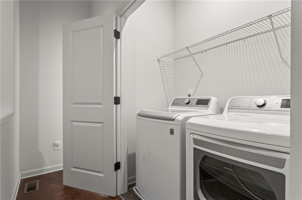 718 Needletail Way Atlanta, GA 30312 - Photo 24 of 44 a utility room with dryer and washer