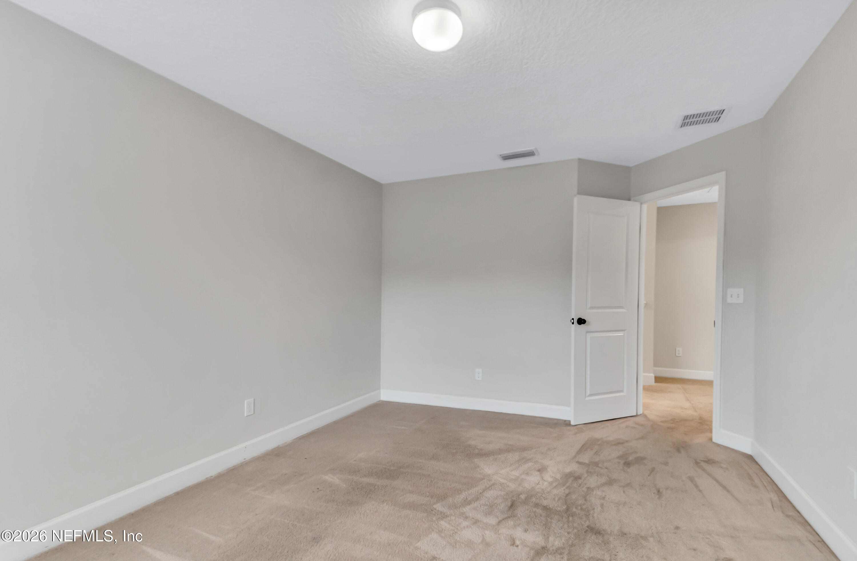 15715 Tisons Bluff Road Jacksonville, FL 32218 - Photo 22 of 48 a view of an empty room