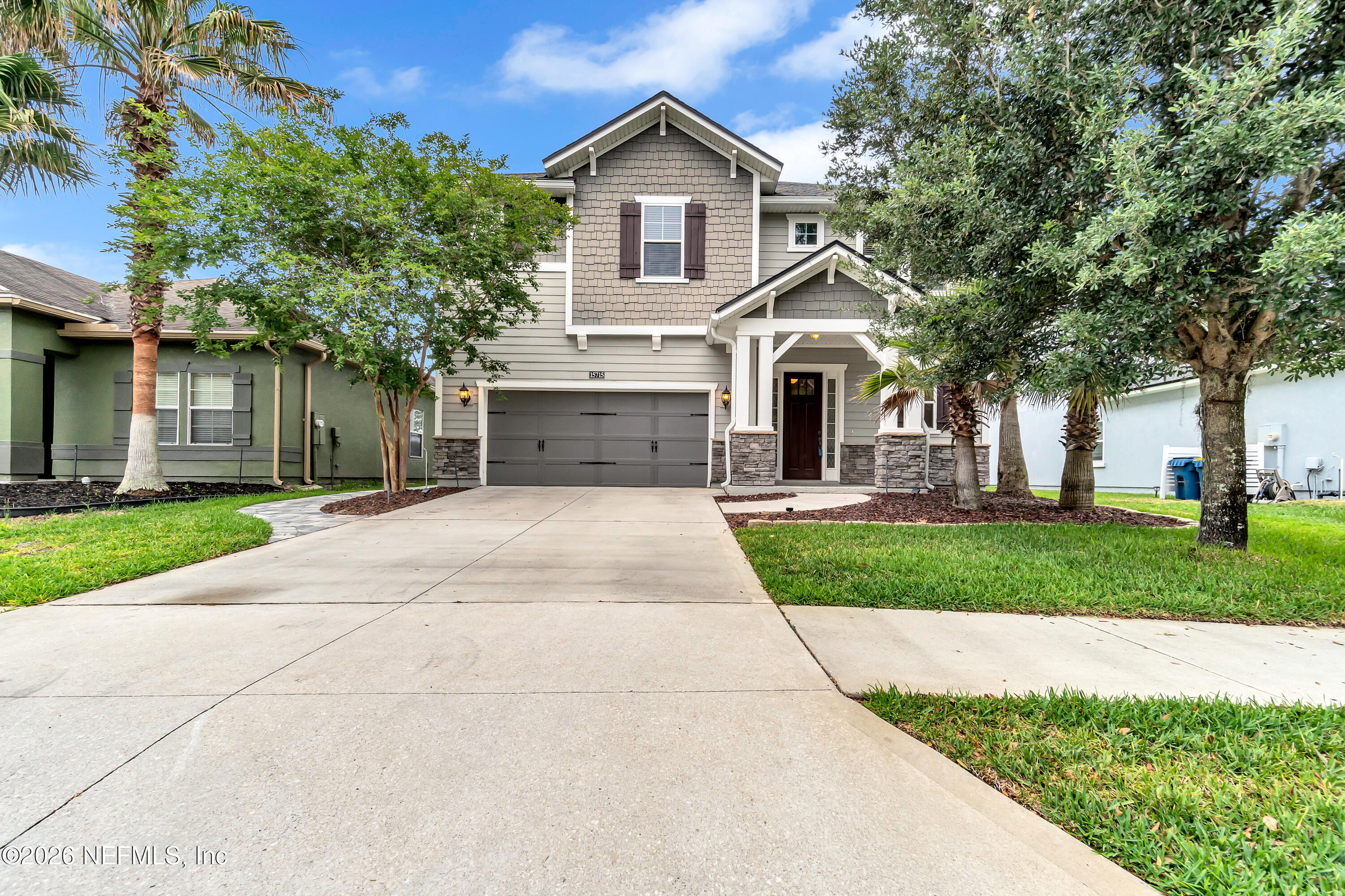 15715 Tisons Bluff Road Jacksonville, FL 32218 - Photo 3 of 48 a house view with a garden space