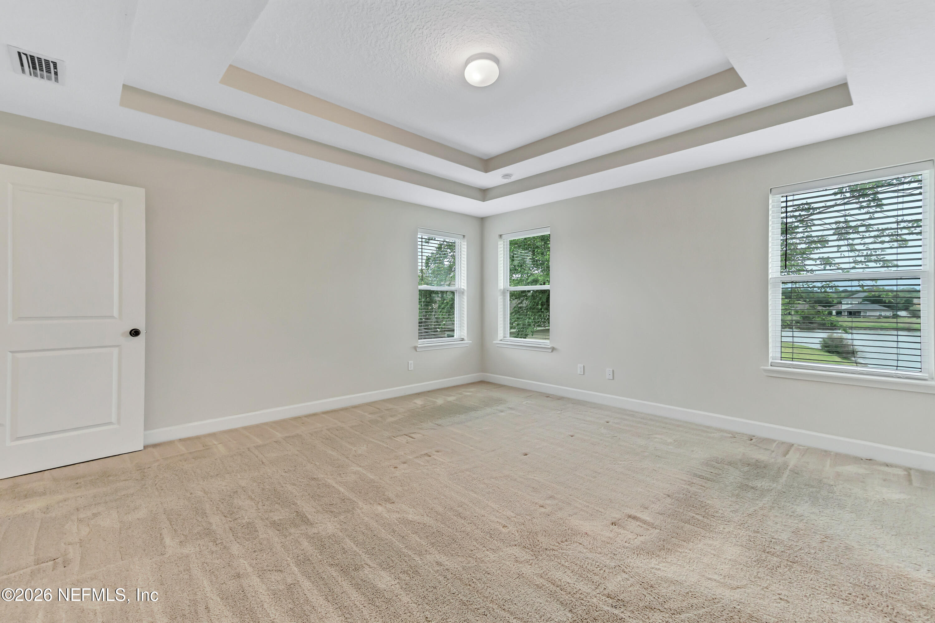 15715 Tisons Bluff Road Jacksonville, FL 32218 - Photo 36 of 48 a view of an empty room with a window