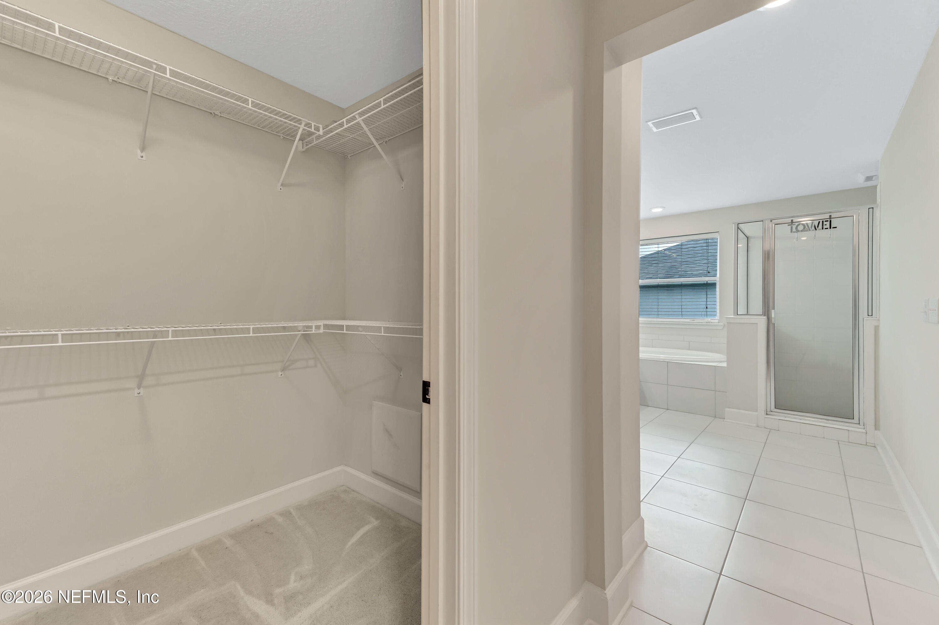 15715 Tisons Bluff Road Jacksonville, FL 32218 - Photo 38 of 48 a bathroom with a bathtub
