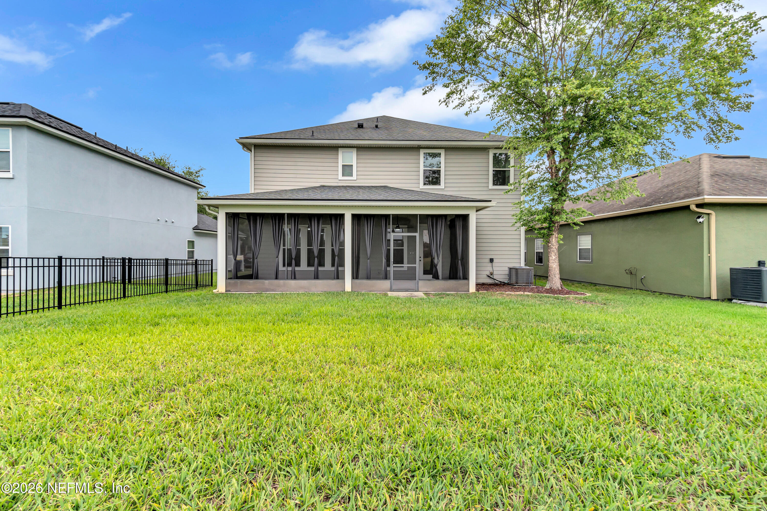 15715 Tisons Bluff Road Jacksonville, FL 32218 - Photo 7 of 48 a view of an house with backyard space and balcony