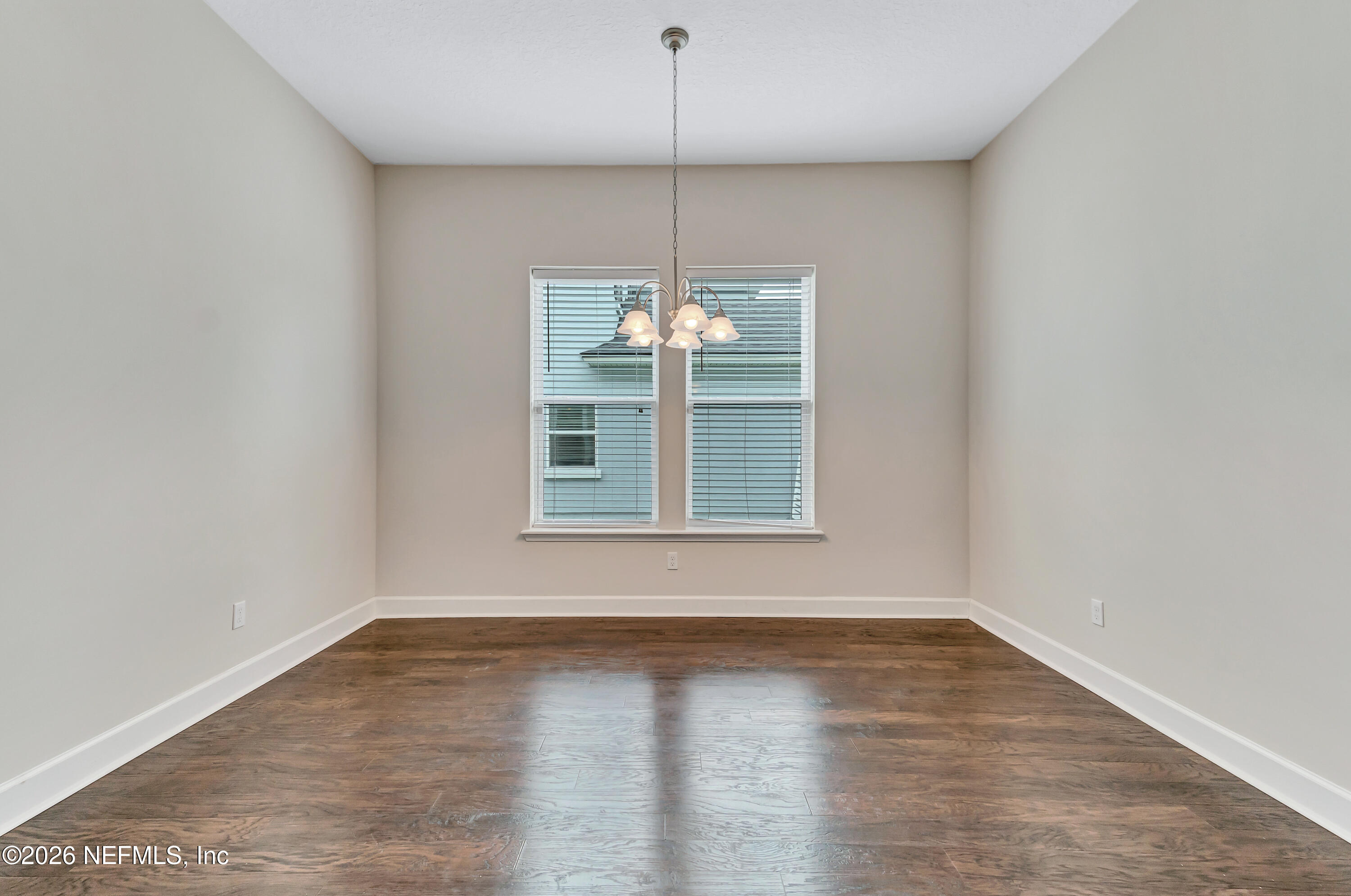 15715 Tisons Bluff Road Jacksonville, FL 32218 - Photo 10 of 48 a view of a room with wooden floor fan and window