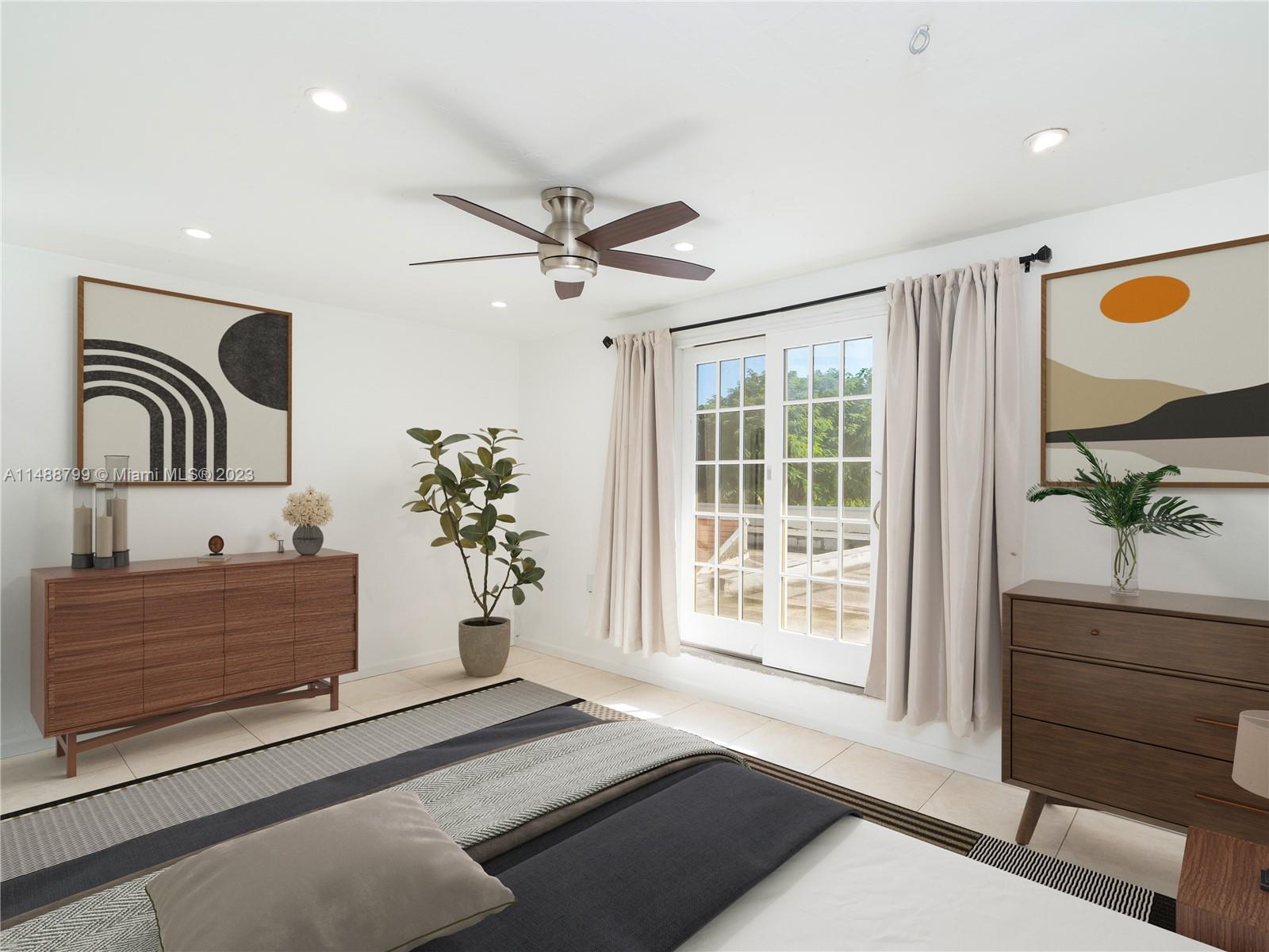 8236 Southwest 103rd Avenue Miami, FL 33173 - Photo 12 of 24 a living room with furniture and window