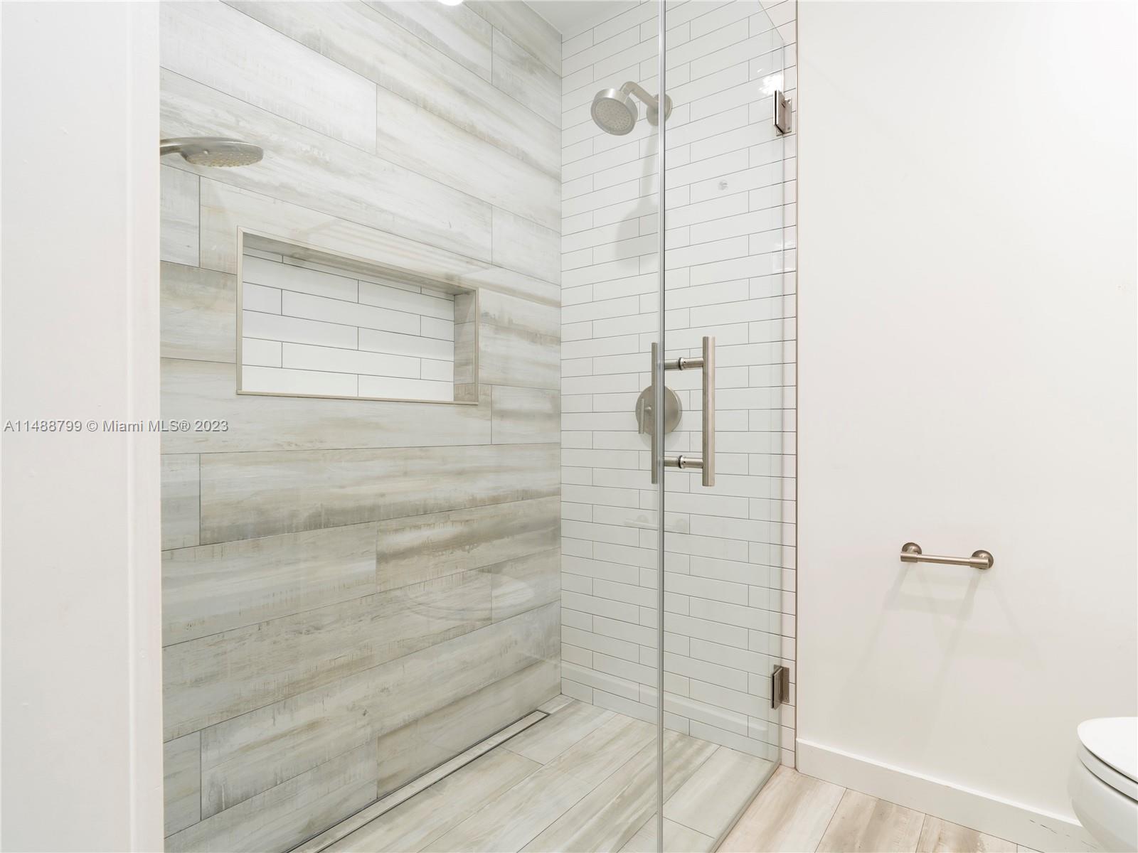 8236 Southwest 103rd Avenue Miami, FL 33173 - Photo 15 of 24 a bathroom with a shower