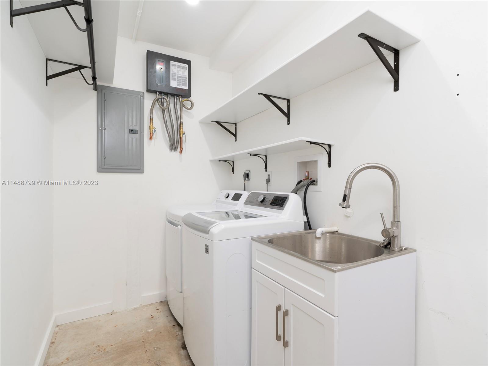 8236 Southwest 103rd Avenue Miami, FL 33173 - Photo 20 of 24 a close view of a sink and tap
