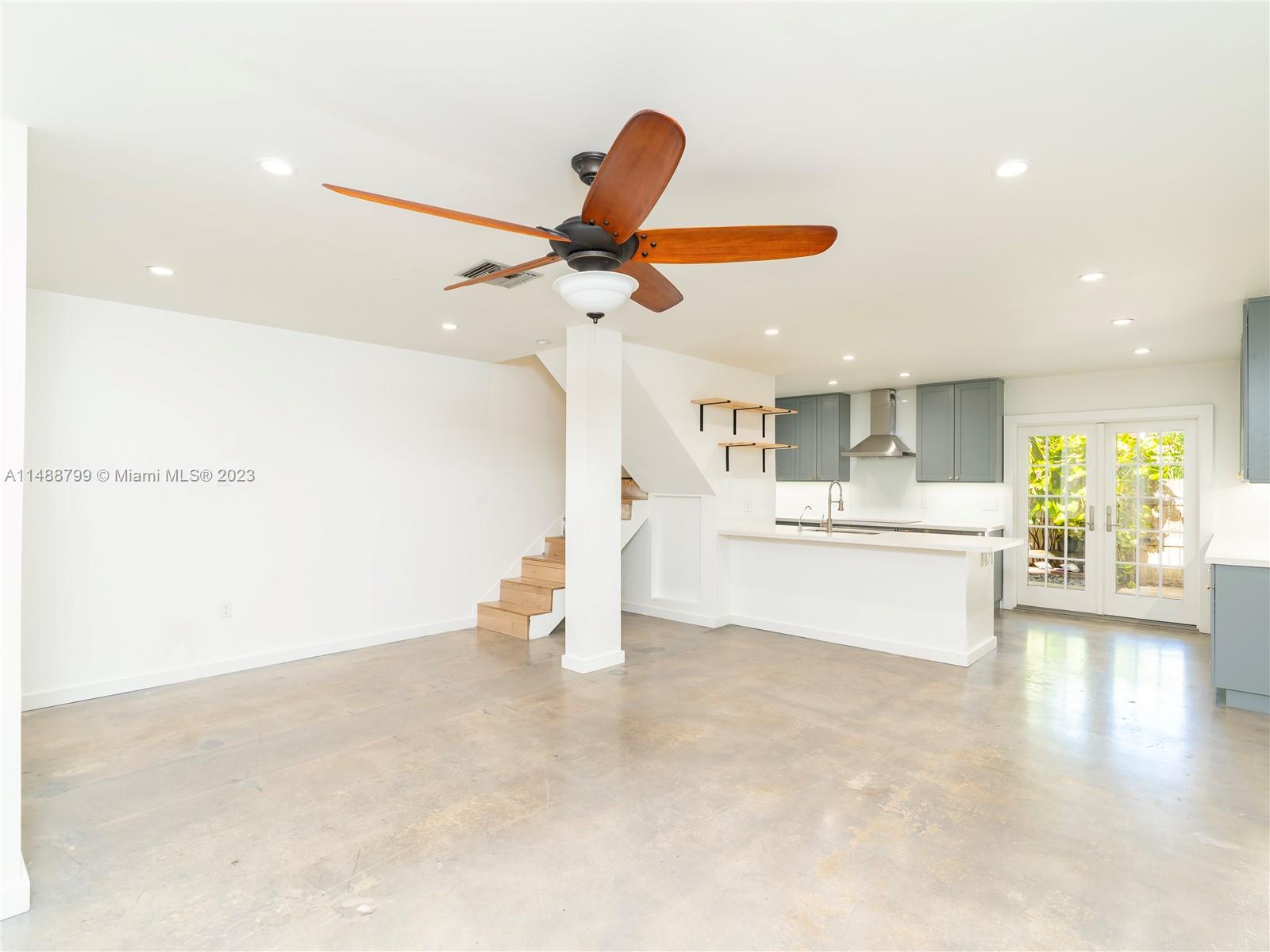 8236 Southwest 103rd Avenue Miami, FL 33173 - Photo 2 of 24 a view of a living room and a ceiling fan