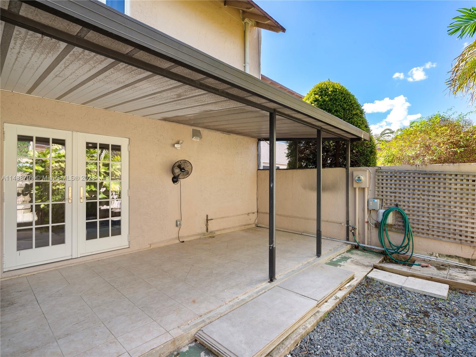 8236 Southwest 103rd Avenue Miami, FL 33173 - Photo 23 of 24 a view of a house with a backyard