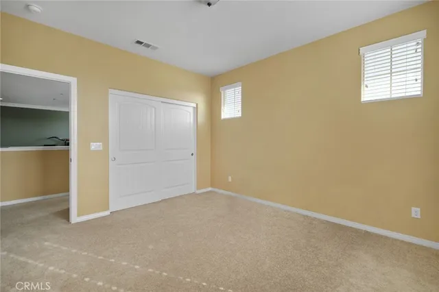 a bathroom with a toilet and a bathtub
