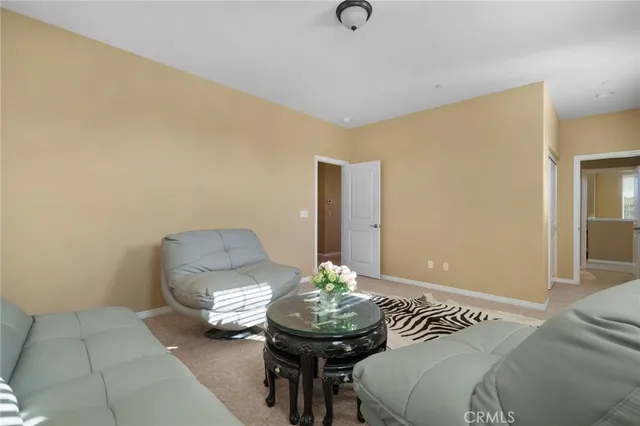 a utility room with cabinets washer and dryer