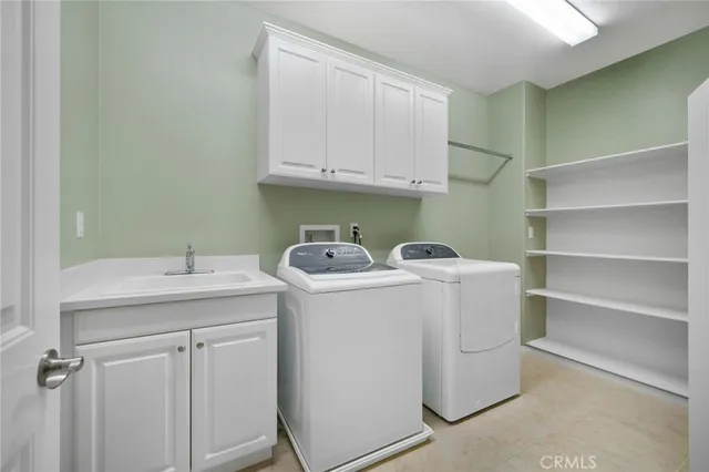 a view of a house with backyard porch and sitting area