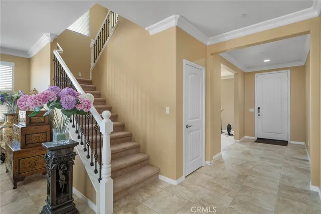 a view of entryway with stairs