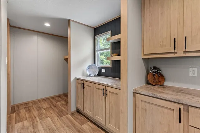 a kitchen with a sink and cabinets