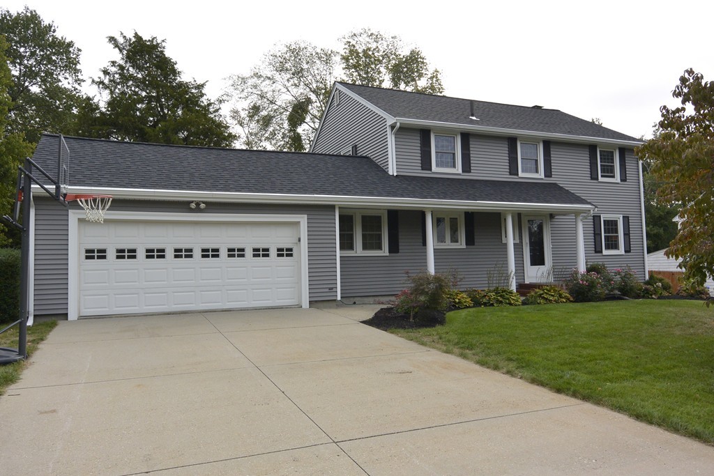 6 Stonybrook Road Medfield, MA 02052 - Photo 1 of 25 front view of a house with a garden