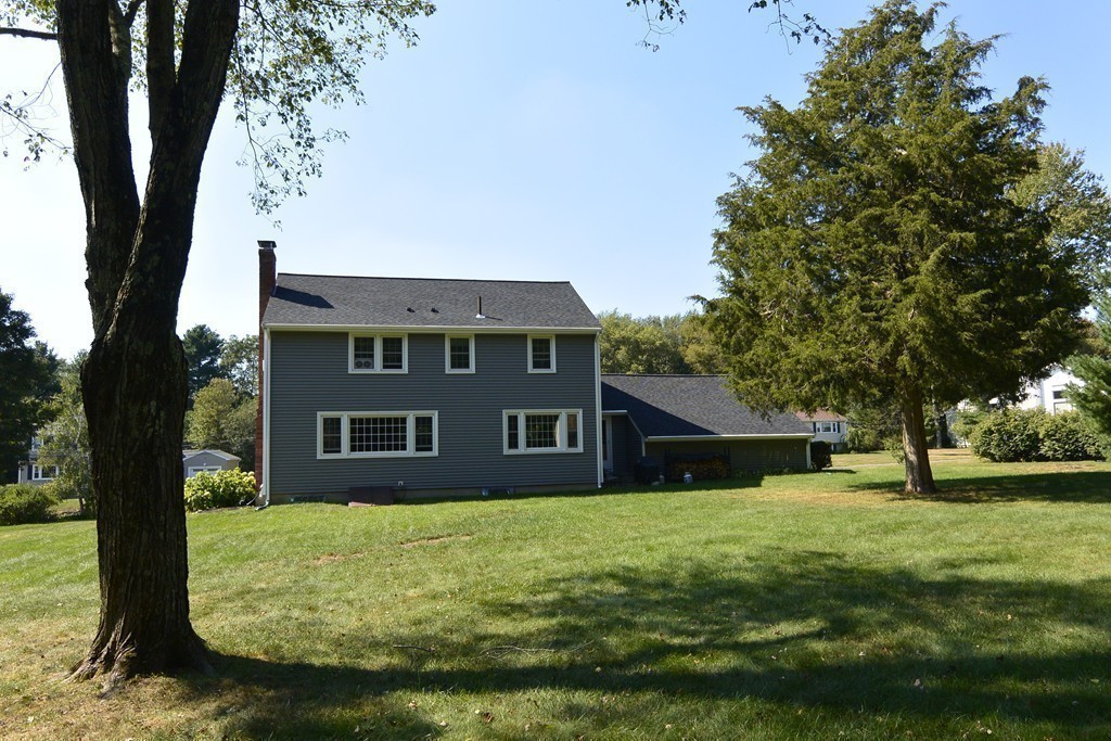6 Stonybrook Road Medfield, MA 02052 - Photo 24 of 25 a view of a house with a yard