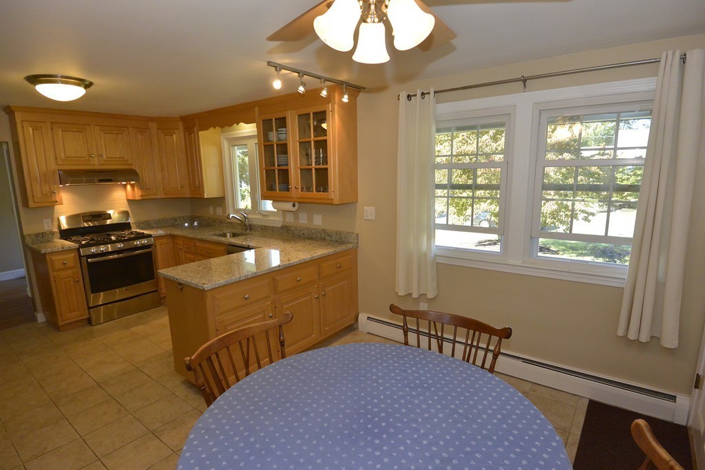 6 Stonybrook Road Medfield, MA 02052 - Photo 6 of 25 a kitchen that has a sink and a stove