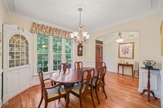 a view of a livingroom with furniture and a flat screen tv