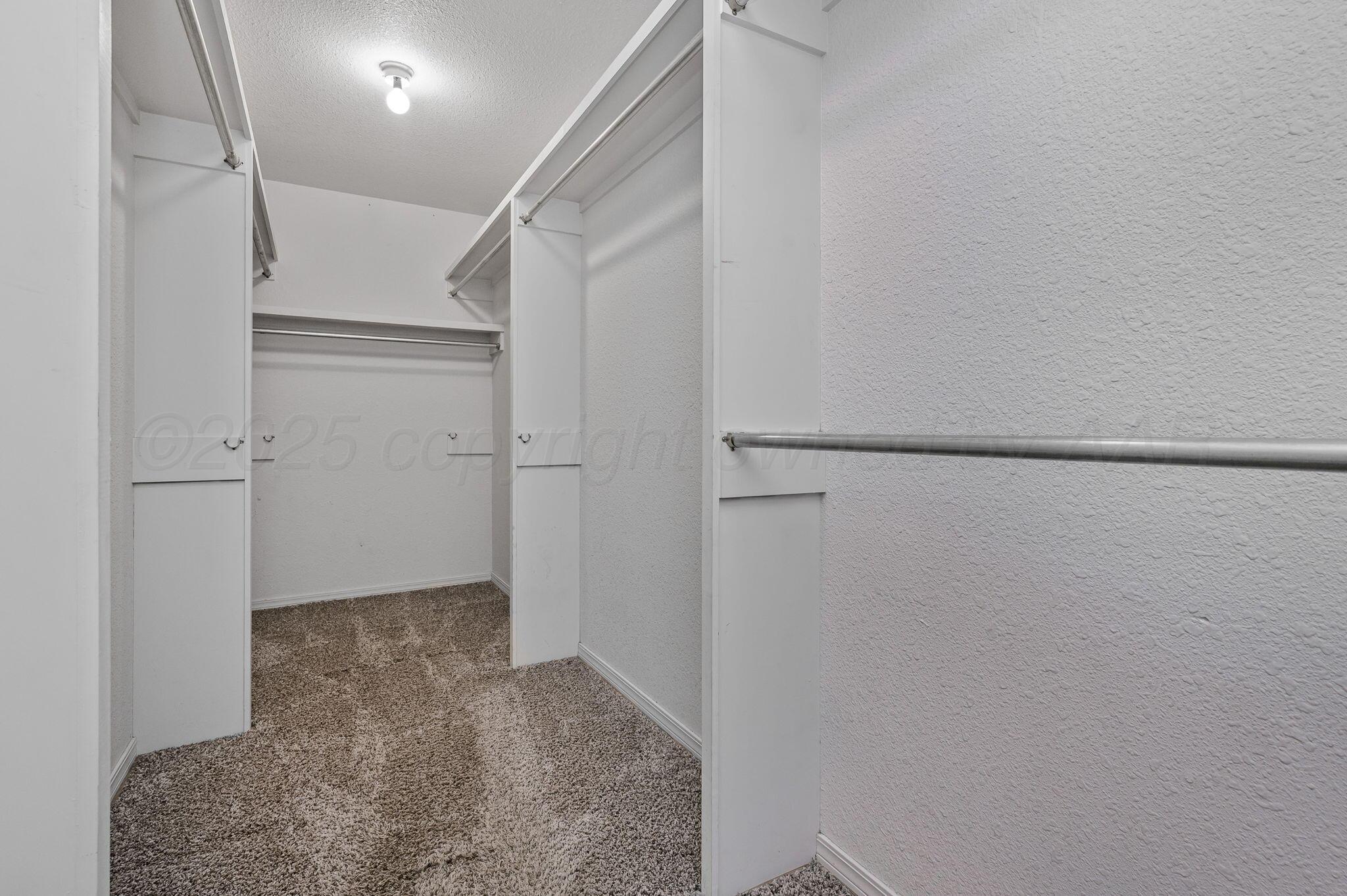 6104 Rutgers Street Amarillo, TX 79109 - Photo 13 of 19 Primary Walk In Closet