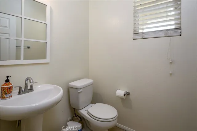 a view of an empty room with racks on the wall