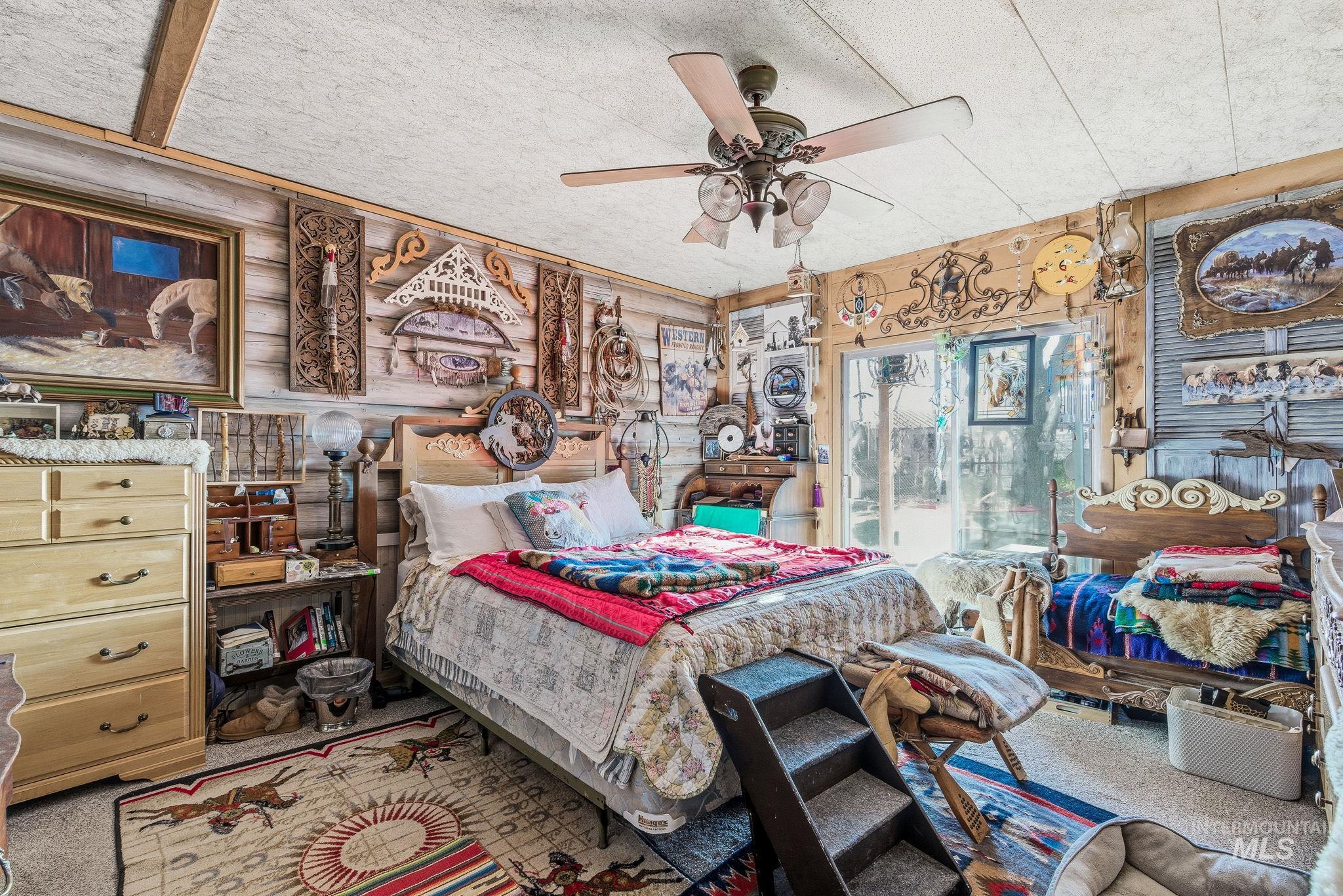 603 East King Road Kuna, ID 83634 - Photo 22 of 24 Carpeted bedroom with a ceiling fan