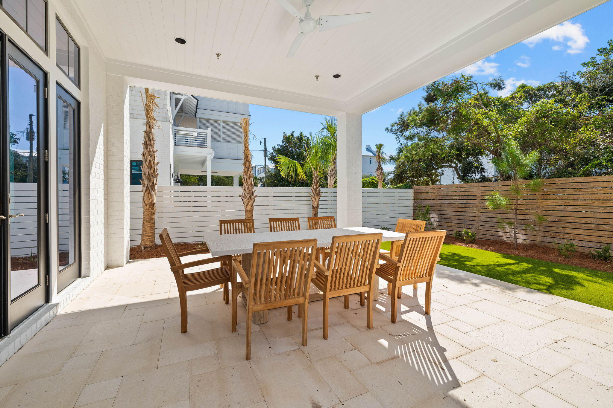 27 Grand Inlet Inlet Beach, FL 32461 - Photo 13 of 65 a view of an outdoor dining space with a table and chairs