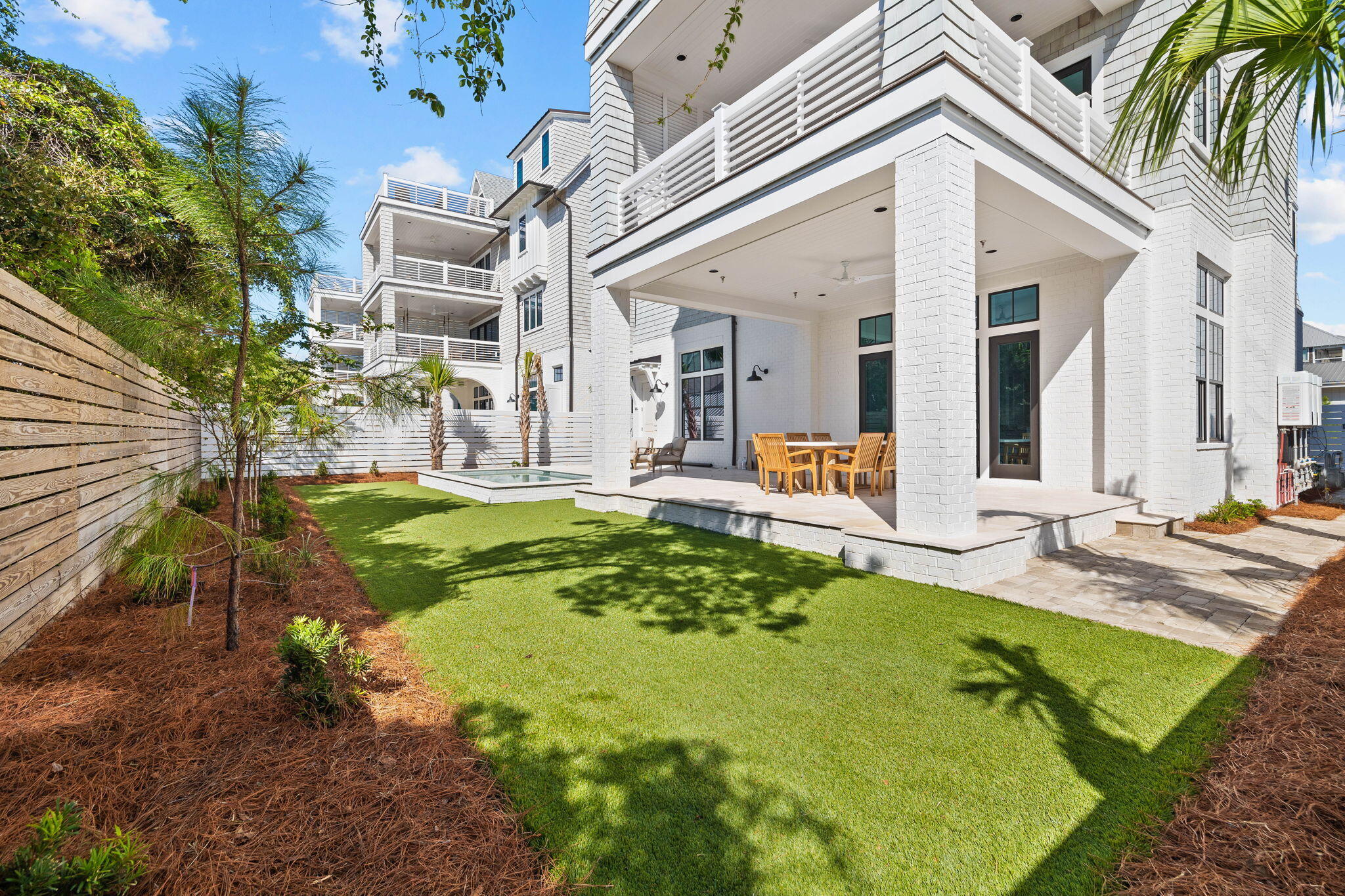 27 Grand Inlet Inlet Beach, FL 32461 - Photo 15 of 65 a view of a house with backyard and sitting area