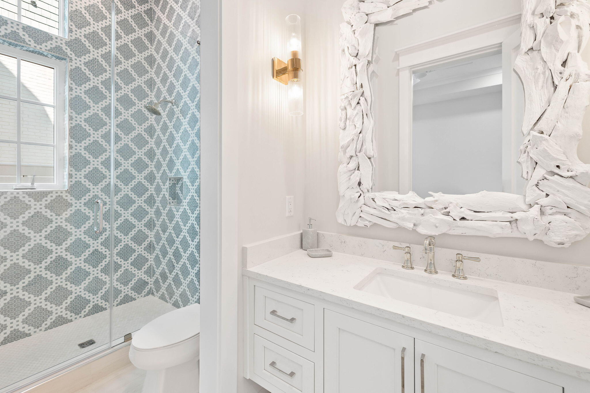 27 Grand Inlet Inlet Beach, FL 32461 - Photo 19 of 65 a bathroom with a sink and a mirror