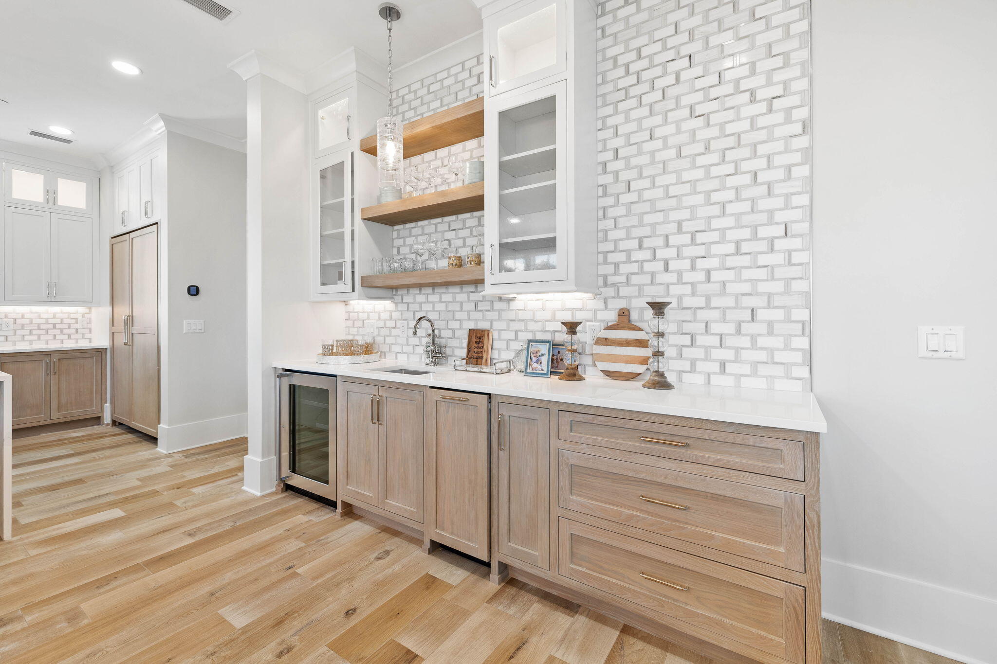 27 Grand Inlet Inlet Beach, FL 32461 - Photo 30 of 65 a kitchen with a sink cabinets and a wooden floor
