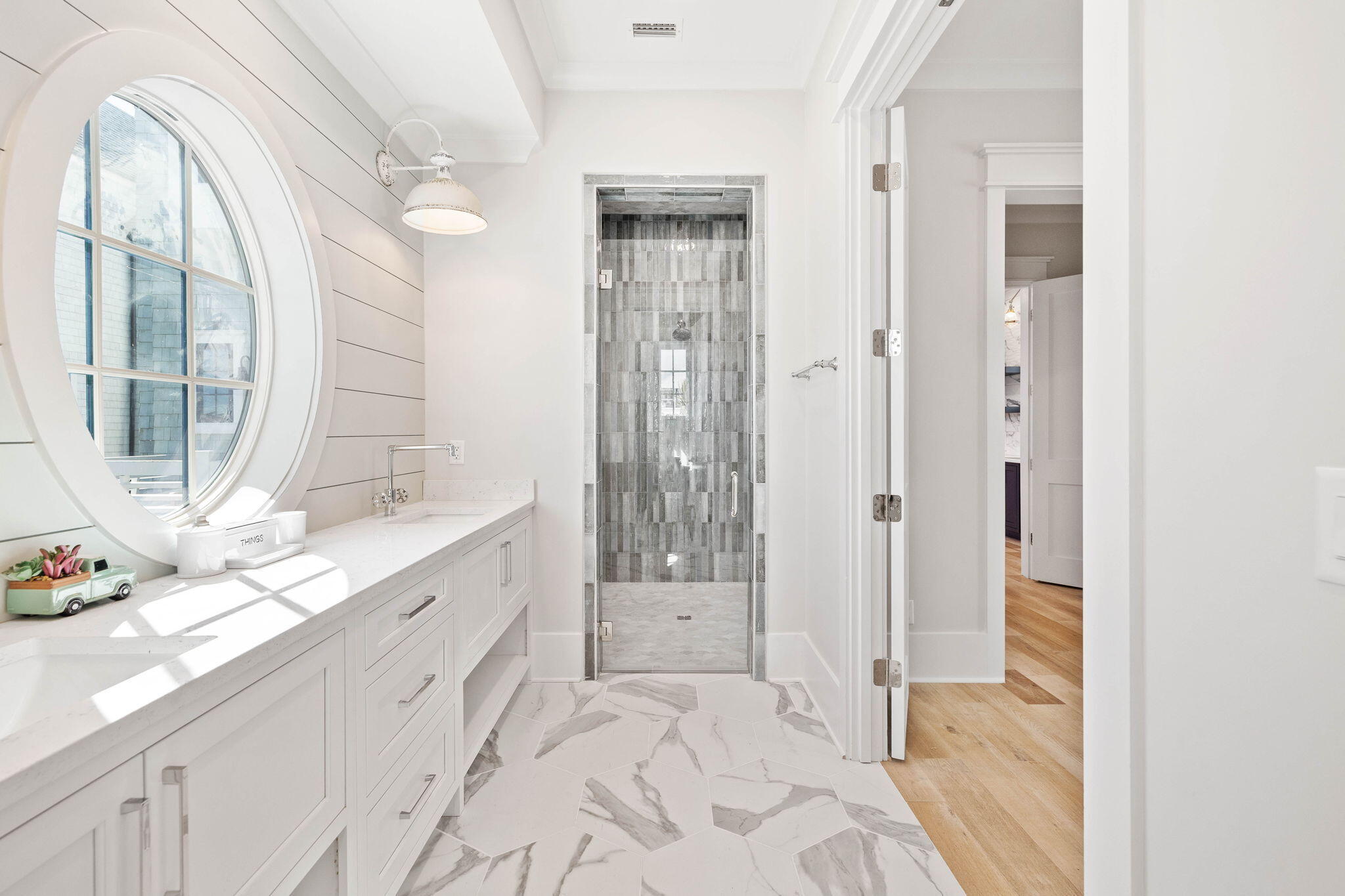 27 Grand Inlet Inlet Beach, FL 32461 - Photo 41 of 65 a spacious bathroom with a granite countertop sink and a mirror