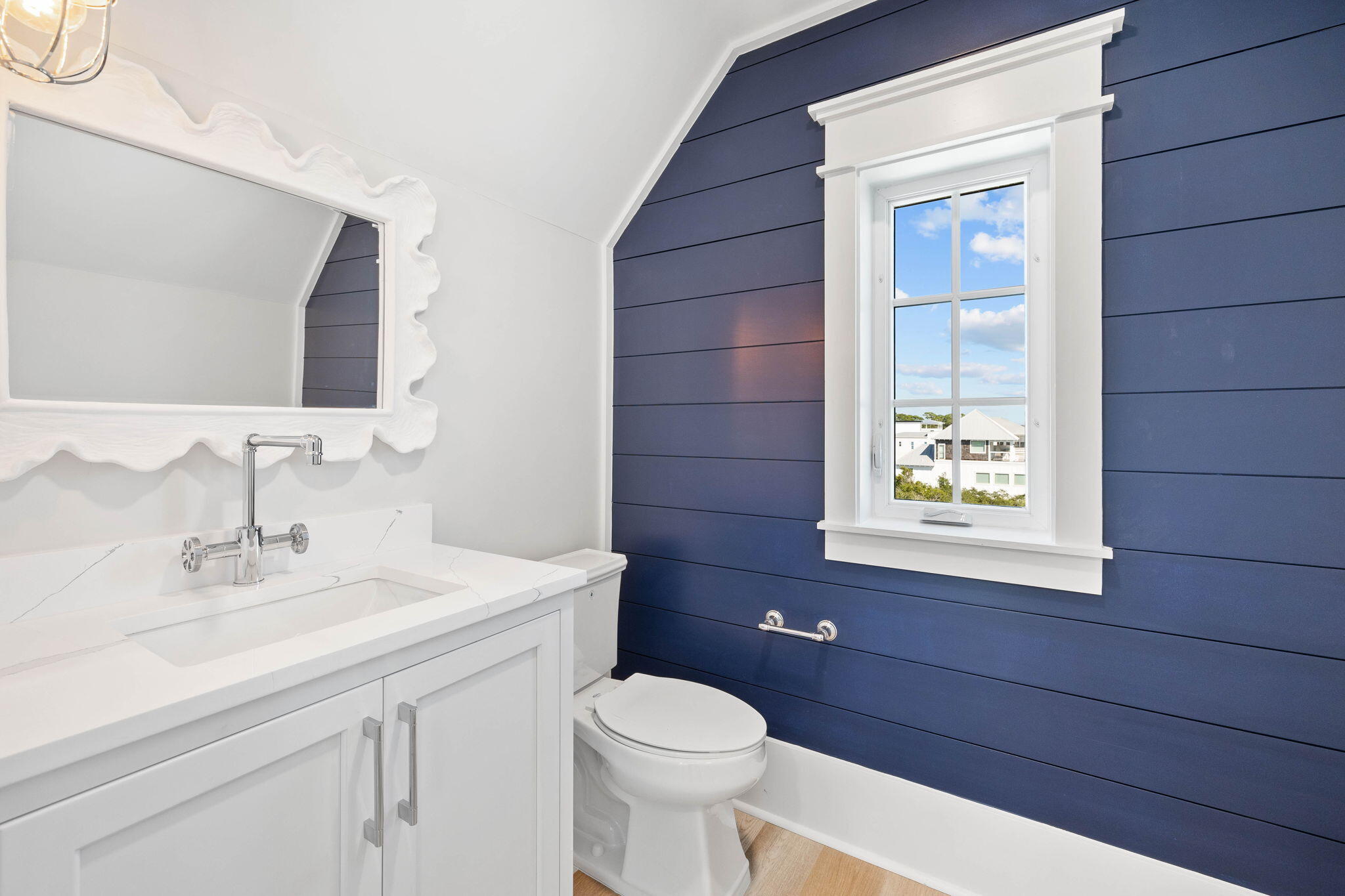 27 Grand Inlet Inlet Beach, FL 32461 - Photo 52 of 65 a bathroom with a toilet sink vanity and mirror