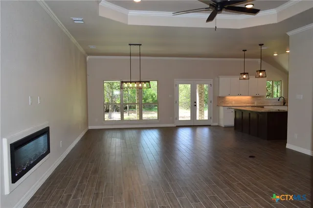 a backyard of a house with lots of green space