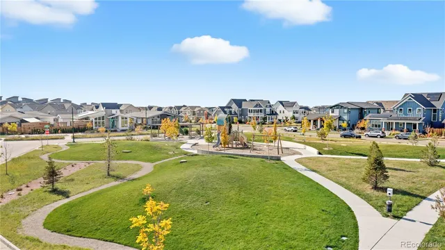 a picture of a bench in front of a wall