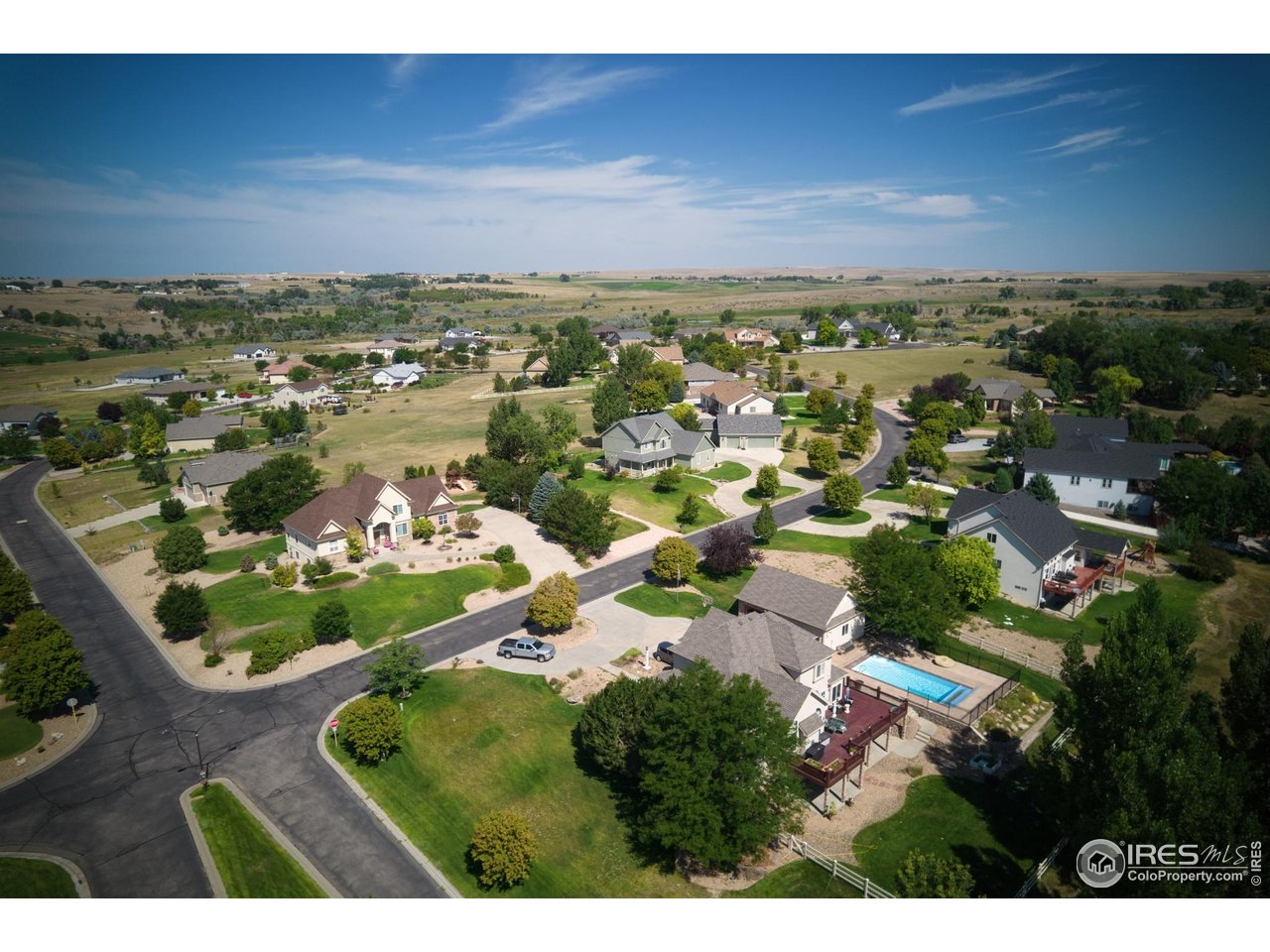 33 Lakeview Circle Fort Morgan, CO 80701 - Photo 6 of 11 an aerial view of a house with a yard