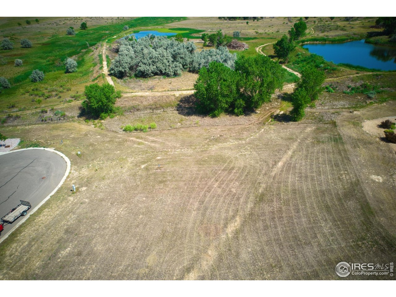 33 Lakeview Circle Fort Morgan, CO 80701 - Photo 8 of 11 a view of a backyard of the house