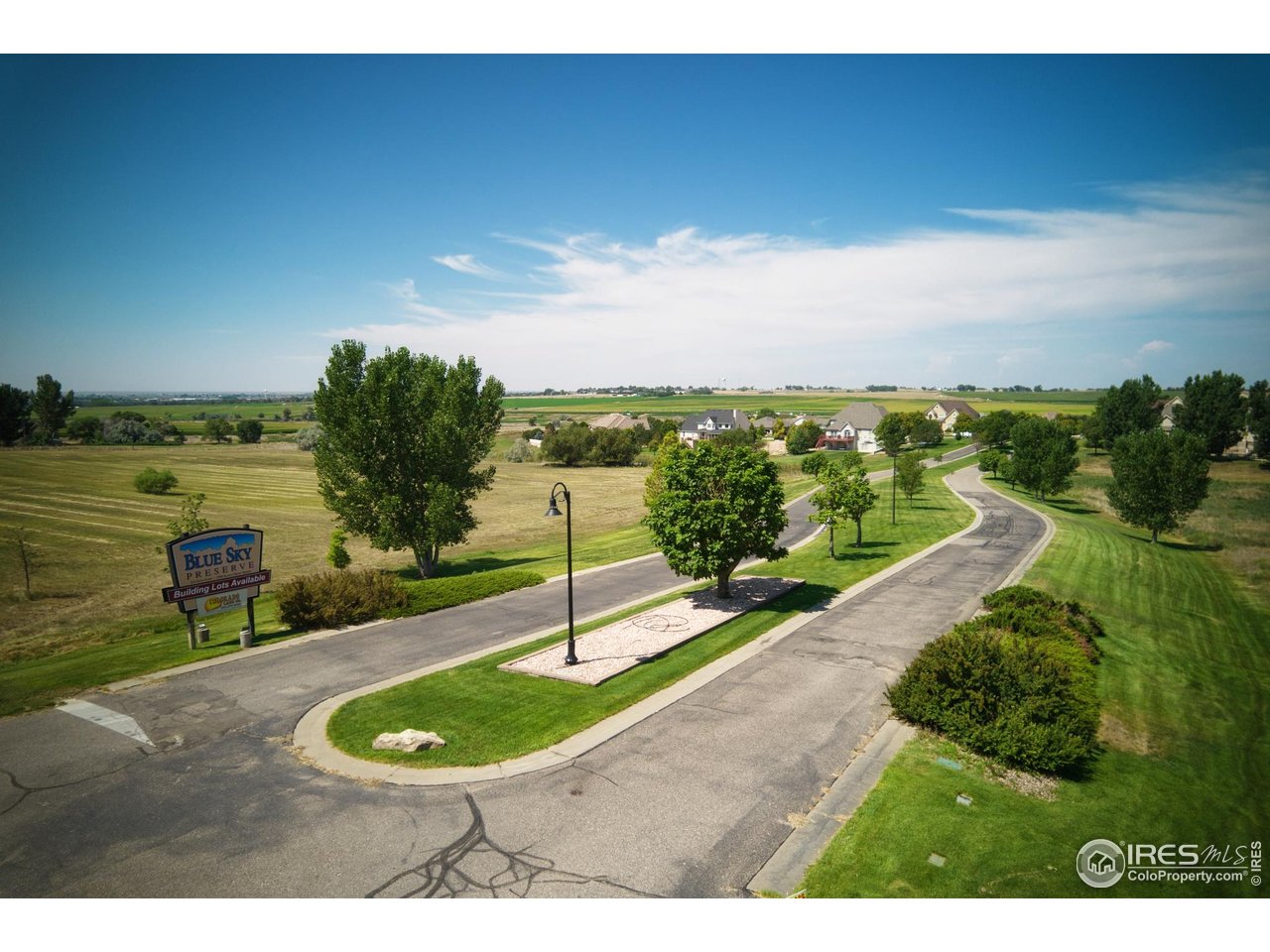 33 Lakeview Circle Fort Morgan, CO 80701 - Photo 10 of 11 a view of a swimming pool with a yard
