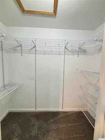 a view of a room with racks on the wall