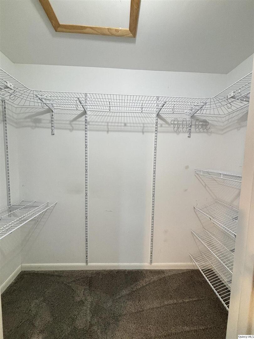 802 West Main Street La Harpe, IL 61450 - Photo 19 of 25 a view of a room with racks on the wall